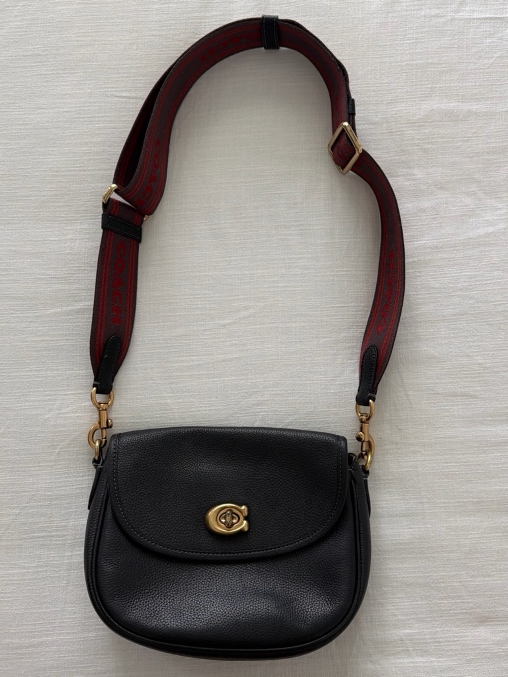 Coach Black Pebbled Leather Crossbody with Red Logo Strap